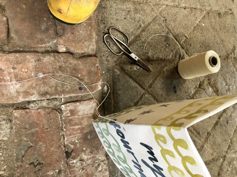 Make a journal - step six - start from the outside, middle hole