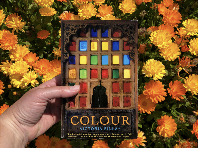 The Travelling Bookbinder: Book Review. Colour by Victoria Hyslop. Photographed in a bed of marigolds by Rachel Hazell