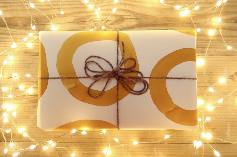 WrapLove - Painted Patterns parcel, tied with Iona Wool