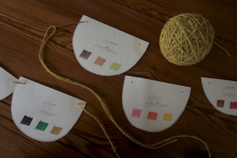 The Travelling Bookbinder: StAnza Bookart: Shades of Spring. Threading each flag into a garland