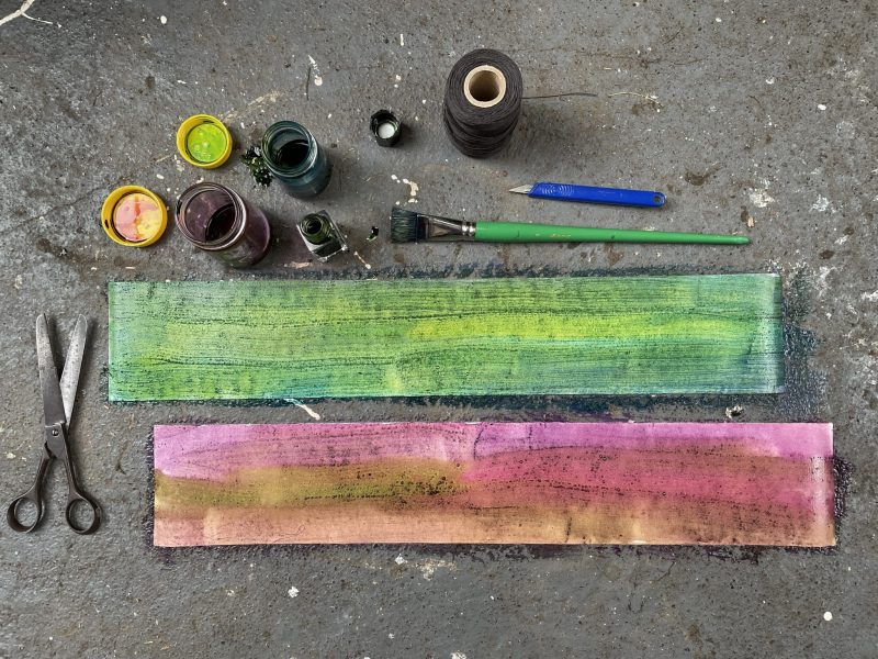 The Travelling Bookbinder: Cut Collage Concertina. Painting the strips