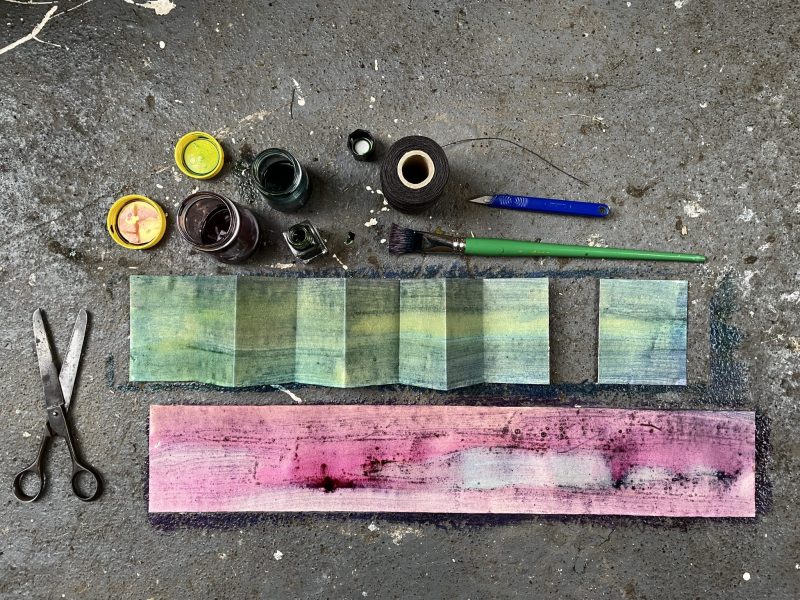 The Travelling Bookbinder: Cut Collage Concertina. Fold shorter strip into eight