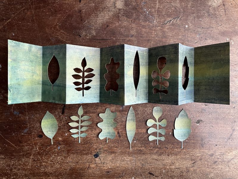 The Travelling Bookbinder: Cut Collage Concertina. Carefully cut the leaf shapes out and keep