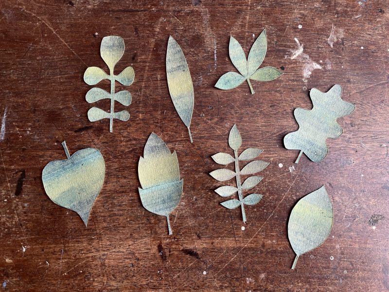 The Travelling Bookbinder: Cut Collage Concertina. Draw leaf shapes in pencil and cut with a scalpel