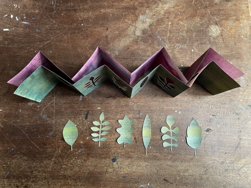 The Travelling Bookbinder: Cut Collage Concertina. Place the two strips together