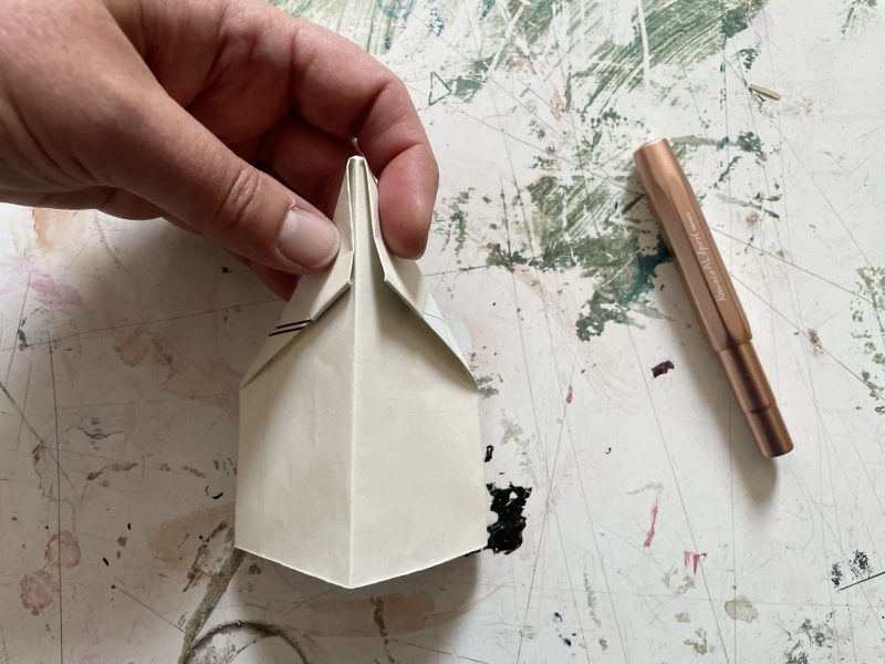 The Travelling Bookbinder: How to fold a paper aeroplane: A MapLove taster project: Fold down centre