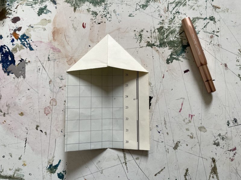 The Travelling Bookbinder: How to fold a paper aeroplane: A MapLove taster project: Second corner down